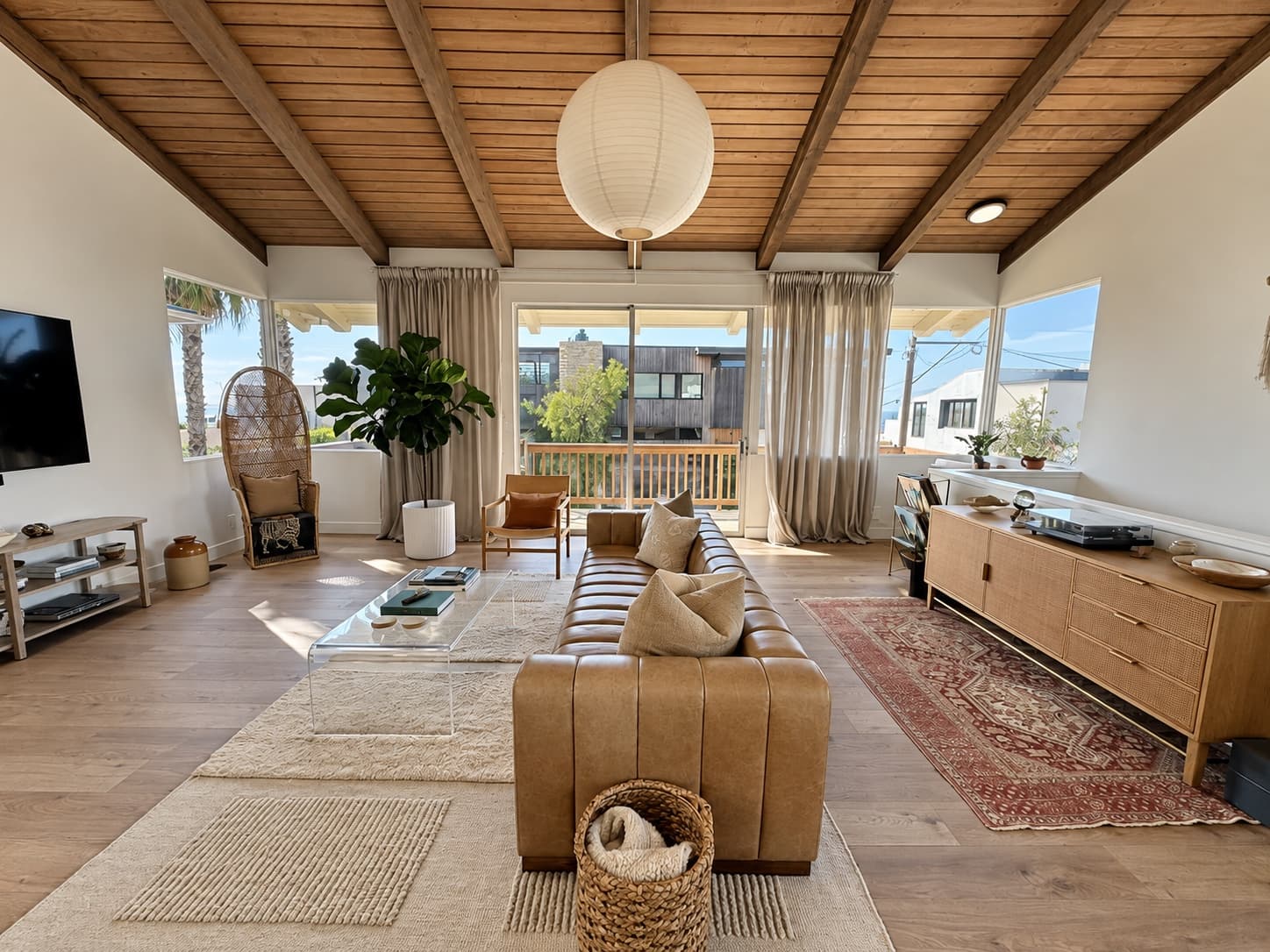 Sunlit living room photographed for Qinti Cleaning